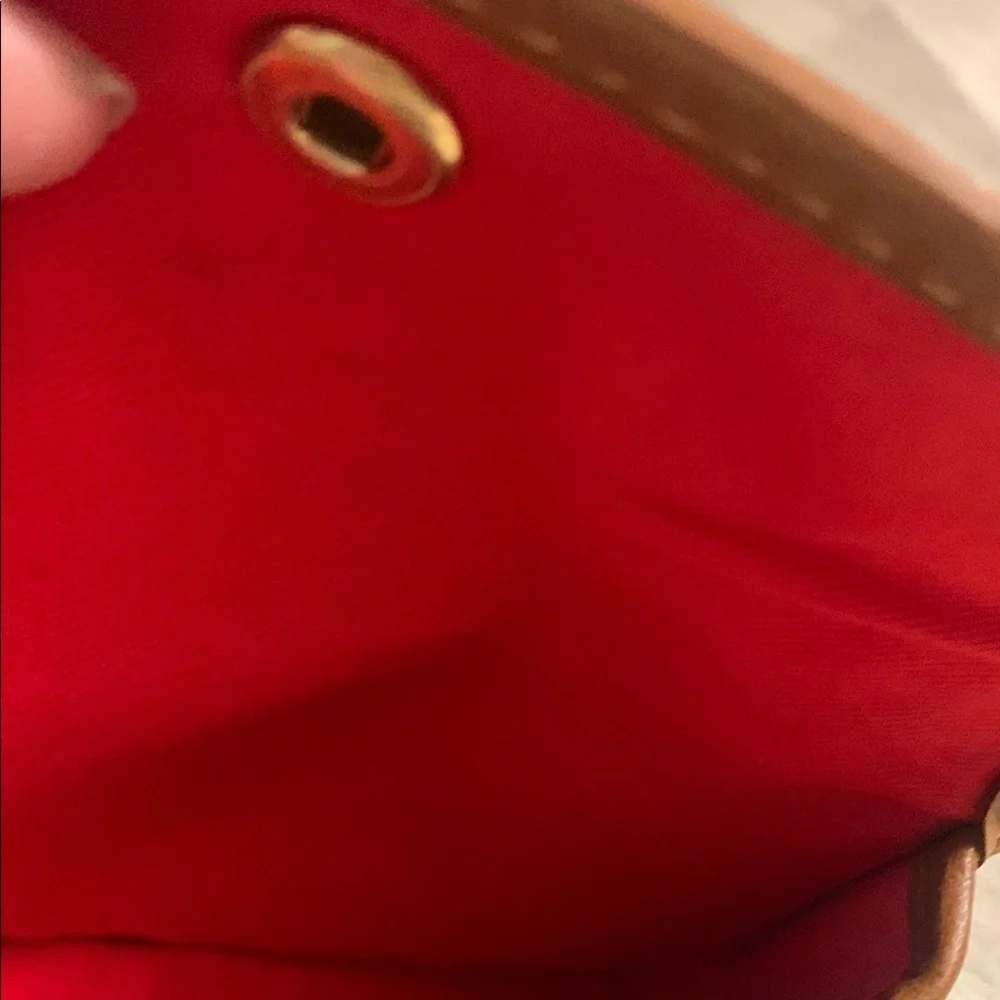 Dooney & Bourke Leather with Flap Closure and Wristlet NEVER USED LIKE NEW